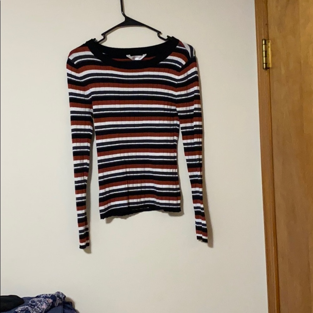 I am selling this multi colored shirt.